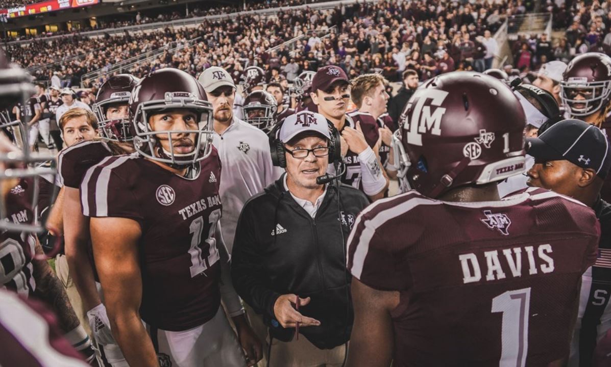 Jimbo with team on Sidelines